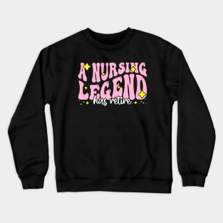 A nursing legend has retired - Funny Groovy Pink Design For Retired Nurse Crewneck Sweatshirt